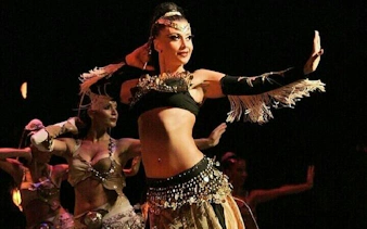 Cabaret dancers performing on stage during a night show in Hurghada.