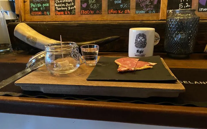 Icelandic bar with traditional food tasting platter and cultural decor.