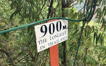 Longest zipline sign in Thailand, 900 meters, Chiang Mai jungle.