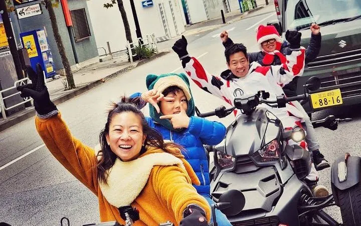 Can-am Ryker riders enjoying a tour in Asakusa, Tokyo, with festive attire.