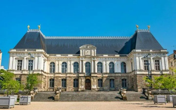 Rennes Parliament building facade on a sunny day, part of self-guided audio tour.