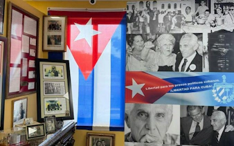Cuban flag and historical photos in a Little Havana museum on Calle Ocho, Miami.