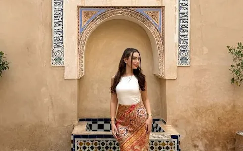 Bahia Palace archway with intricate tilework in Marrakesh.