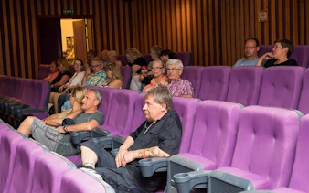 Visitors seated in a theater during the Private City Tour & Culturama, Sharm El Sheikh.