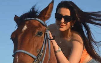 Horseback rider in Sharm El Sheikh desert tour.