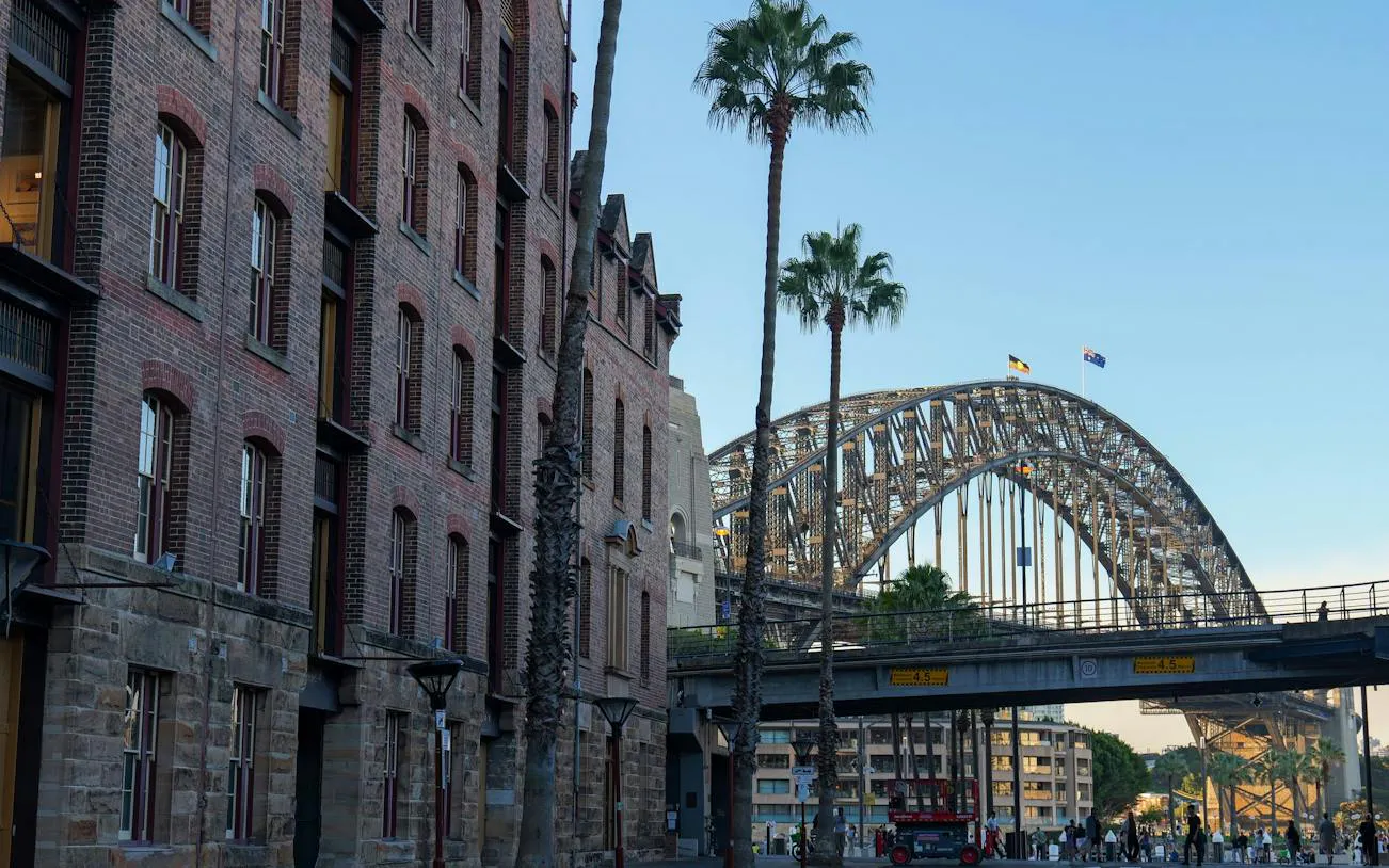 Historic buildings and Sydney Harbour Bridge on a self-guided audio walking tour from The Rocks to the Opera House.