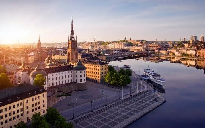 Stockholm cityscape with Riddarholmen Church and waterfront, viewed during a self-guided walking tour.