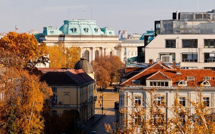 Sofia cityscape with historic buildings and autumn trees on a self-guided walking tour.
