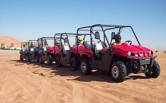 Family buggy cars lined up for desert safari in Sharm El Sheikh's Echo Valley.