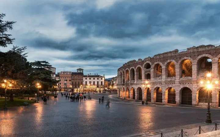 Verona Arena at dusk during self-guided walking tour with mobile app.