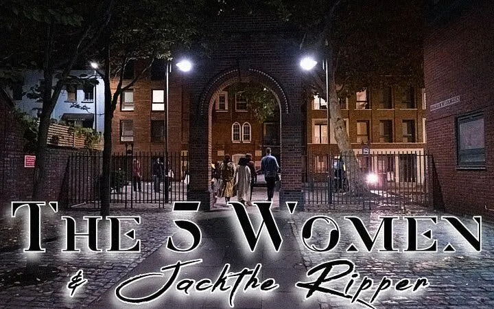 Walking tour group in London exploring Jack the Ripper sites at night.