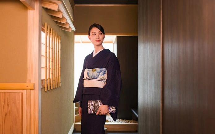 Person wearing a silk kimono at Shinjuku Gyoen National Garden.