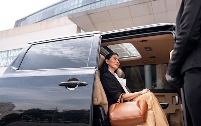 Private transfer service with passenger in luxury vehicle, Taghazout to Marrakesh.