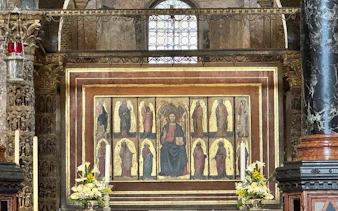 St Mark's Basilica interior mosaic artwork during guided tour in Venice.