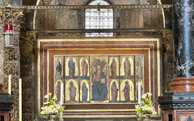 St Mark's Basilica interior mosaic artwork during guided tour in Venice.