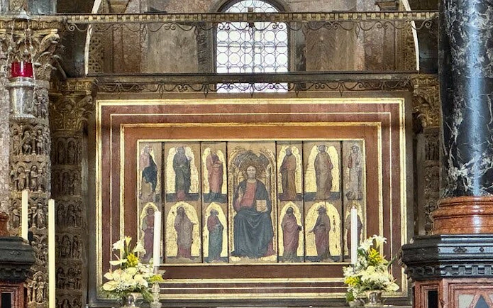 St Mark's Basilica interior mosaic artwork during guided tour in Venice.