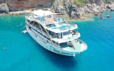 From Antalya to Kemer Mega Star Boat Trip Lunch & Hotel pick up