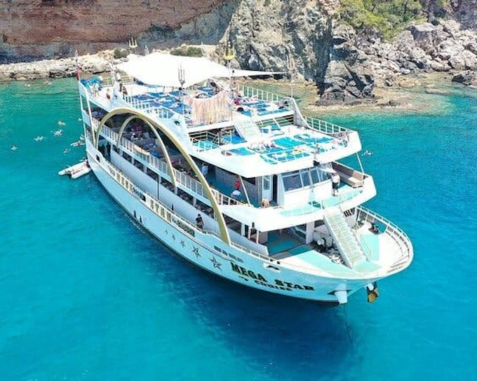 From Antalya to Kemer Mega Star Boat Trip Lunch & Hotel pick up