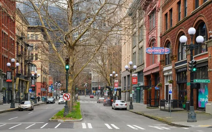 Seattle street view with historic buildings, part of the Gold Rush self-guided city exploration game.