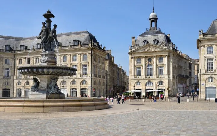 Place de la Bourse fountain and historic buildings in Old Town Bordeaux.