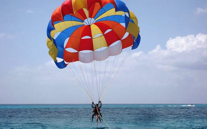 Parasailing over the Red Sea with colorful parachute, Hurghada.