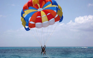 Parasailing over the Red Sea with colorful parachute, Hurghada.