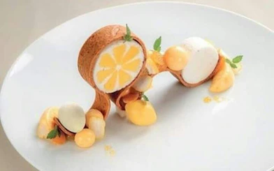 Elegant dessert served at Grand Hotel Oslo during Oslo Walking Tour.