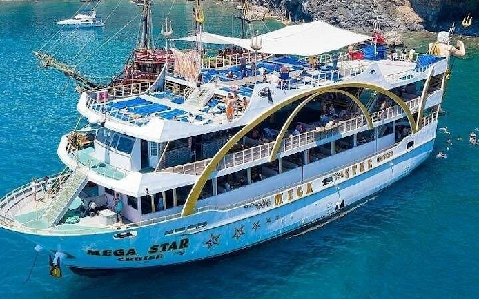 From Antalya to Kemer Mega Star Boat Trip Lunch & Hotel pick up