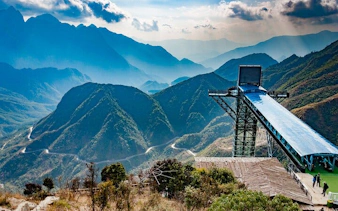 Glass bridge overlooking mountains on Silver Waterfall, Heaven Gate tour.