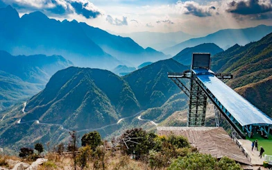 Glass bridge overlooking mountains on Silver Waterfall, Heaven Gate tour.