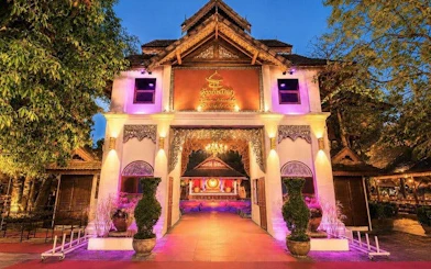 Khum Khantoke entrance lit up for Chiang Mai's Lanna Cultural Show and Khantoke Dinner.