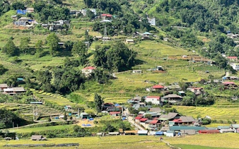 Sapa terraced rice fields and village view, Ta Van homestay area, Vietnam.