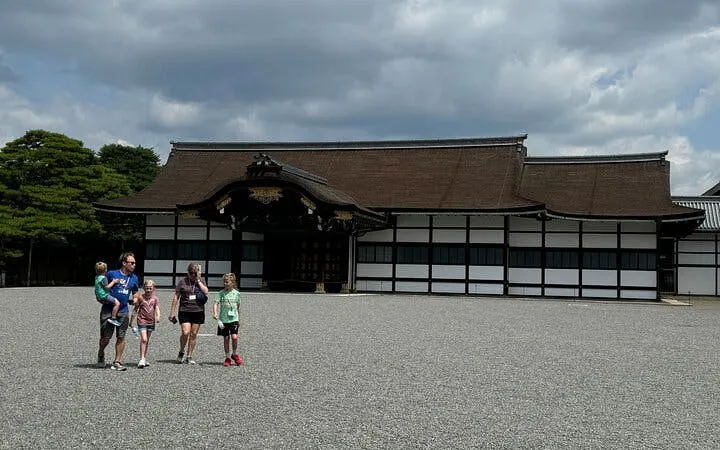Family walking in front of Kyoto Imperial Palace during a private tour.