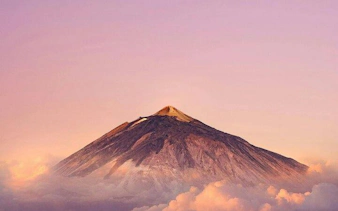 Teide volcano at sunset with clouds, Teide National Park, Tenerife.
