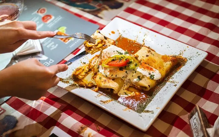 Traditional Hungarian dish served on a checkered tablecloth during Budapest food tour.