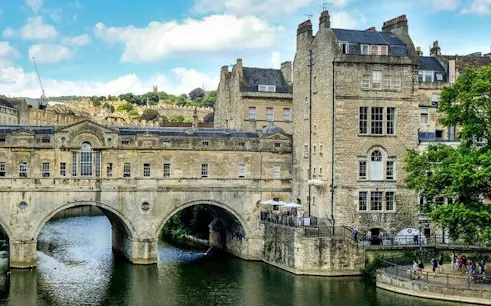 Pulteney Bridge over River Avon in Bath, England, seen on a self-guided walking tour.