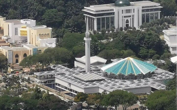 National Mosque of Malaysia with its blue and green roof in Kuala Lumpur, part of Batu Caves tour.