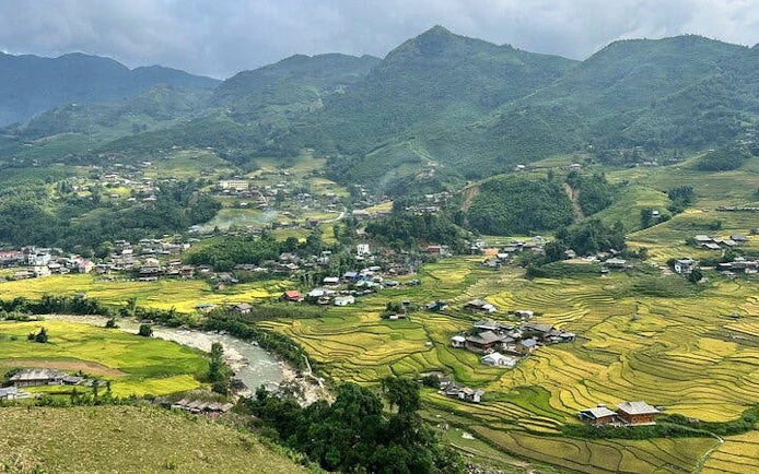 Sapa rice terraces and village view, Vietnam, part of trekking and Dzay homestay experience.