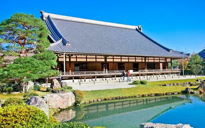 Arashiyama temple with traditional architecture and garden pond, Kyoto.