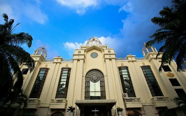 Golden Dome Cabaret theater exterior in Bangkok with ornate architecture.