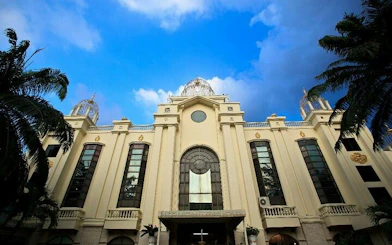 Golden Dome Cabaret theater exterior in Bangkok with ornate architecture.
