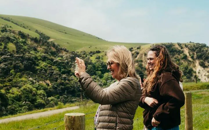 Tourists enjoying scenic views on Christchurch City Top Sights Half Day Tour.