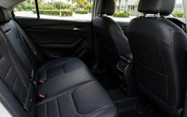 Backseat view of a private transfer vehicle for Puerto Morelos to Cancun Airport, Riviera Maya.