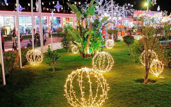 Garden with illuminated decorations at night, Sharm El Sheikh city tour.