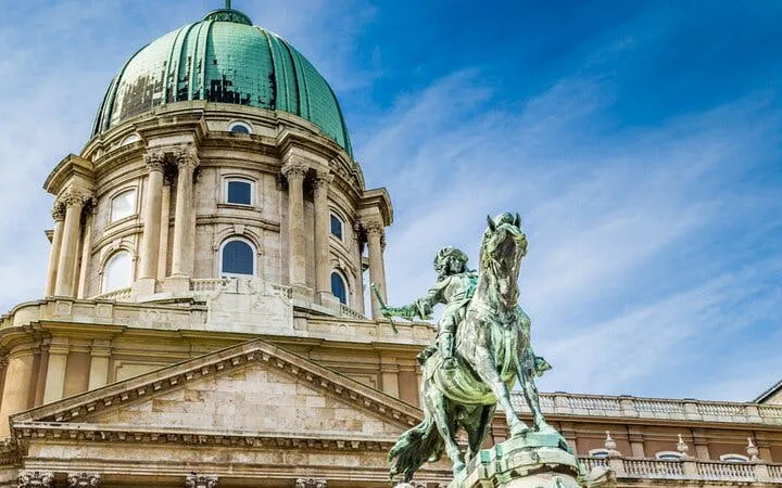 Buda Castle dome and equestrian statue in Budapest.