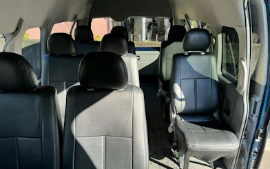 Interior of a private charter van for Kyoto tour with airport or port transfer.