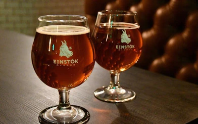 Two glasses of Einstök beer on a table in an Icelandic family-owned restaurant.