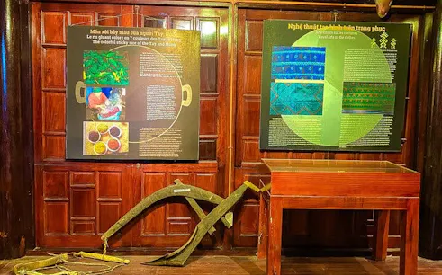 Exhibit of traditional tools and textiles at Sapa Museum on the Sapa Private Cultural Tour.