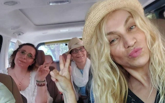 Tourists enjoying a private car ride in Korea with flexible itinerary.