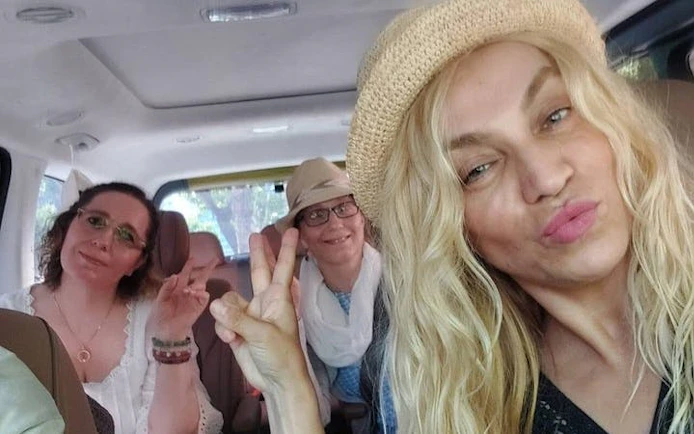 Tourists enjoying a private car ride in Korea with flexible itinerary.